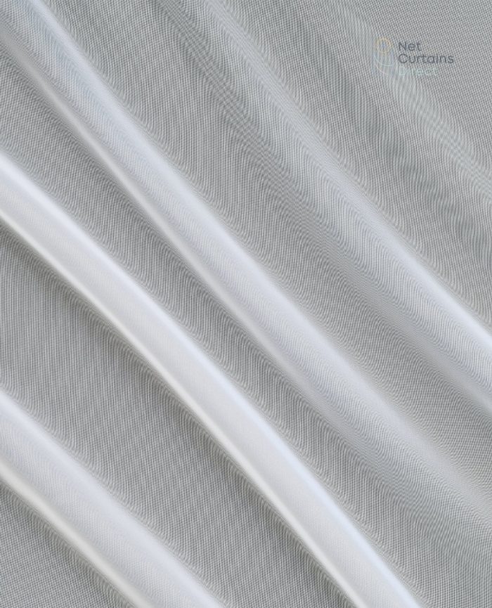 Voile has a softer, more floaty feel then net, while still offering privacy. This is a plain white voile curtain with a lead weighted hem to ensure the curtain hangs neatly.