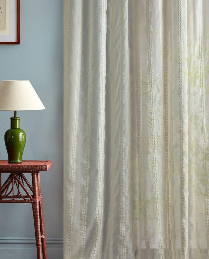 Cream voile curtains with vertical embroidered stripes